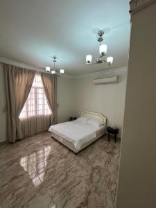 Una cama o camas en una habitación de Moon hostel