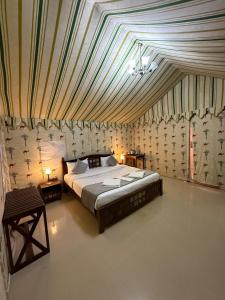 Postel nebo postele na pokoji v ubytování Dune safari camp & resort
