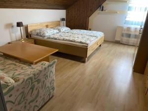 Postel nebo postele na pokoji v ubytování Ferienhaus Monika