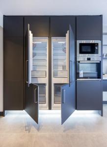 Η κουζίνα ή μικρή κουζίνα στο Utopia Suite Residence1 +31 φωτογραφίες