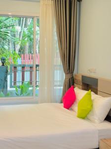 Ένα ή περισσότερα κρεβάτια σε δωμάτιο στο Family Villa with Pool, Garden near Aonang beach