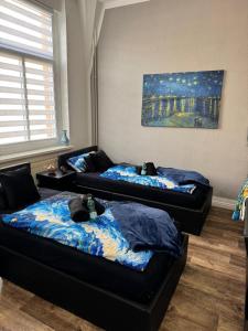 Postel nebo postele na pokoji v ubytování Apartment Van Gogh