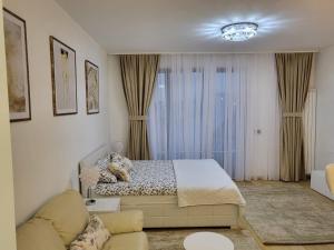 Postel nebo postele na pokoji v ubytování SARA Lux Novi Dorcol