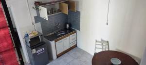 Kuchyň nebo kuchyňský kout v ubytování Apart Pelusa + 12 fotografií