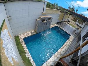 an overhead view of a swimming pool in a house at MICASO Guest House in Limbe
