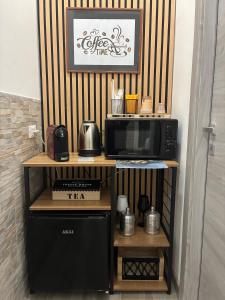 Η κουζίνα ή μικρή κουζίνα στο Mamma Chica Alloggio Turistico a Palermo