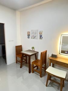 TV a/nebo společenská místnost v ubytování The wells house krabi + 11 fotografií