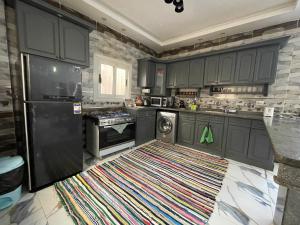 Kuchyň nebo kuchyňský kout v ubytování Nubian Villa with Private Pool