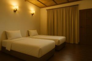 Postel nebo postele na pokoji v ubytování Redang Divers Resort + 1 fotografie