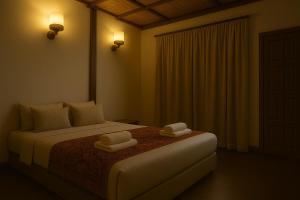 Postel nebo postele na pokoji v ubytování Redang Divers Resort