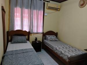 Postel nebo postele na pokoji v ubytování Casa em São Brás - Belém - COP30