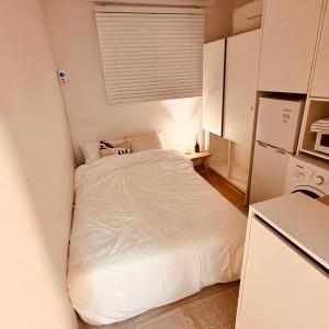 Voodi või voodid majutusasutuse StayProvence40 toas