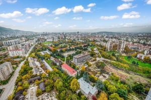 an aerial view of a city with buildings at Sky-High 1BR 30 Floor Spa,Gym Cevahir Tower A in Skopje