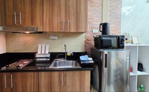 Køkken eller tekøkken på Luxe Vintage with Best View MallofAsia Airport