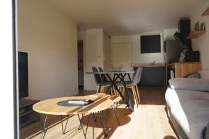 TV a/nebo společenská místnost v ubytování Alexandre