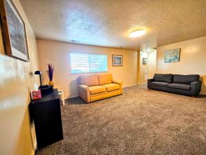 a living room with two chairs and a couch at Spacious Ski Base Near The Best Resorts in Salt Lake City +20 photos