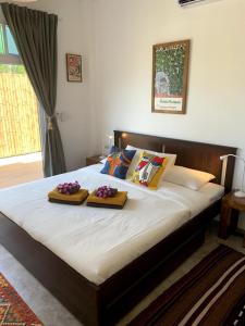 Postel nebo postele na pokoji v ubytování Boho-Luxe Pool Villa with Simply Amazing Views + 49 fotografií