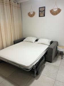 Postel nebo postele na pokoji v ubytování Chez TOONS