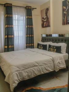 Postel nebo postele na pokoji v ubytování Casa Almasi