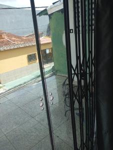 a view of a balcony from a room with a window at Cop 30 in Belém