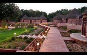 a garden with lights in the yard of a house at Sawitri Ayurveda in Jodhpur