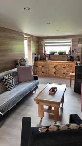 Χώρος καθιστικού στο Víkendový dom pod Sidorovom +6 φωτογραφίες