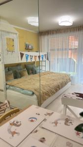 Postel nebo postele na pokoji v ubytování Benjamínek rodinný apartmán