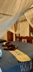 Postel nebo postele na pokoji v ubytování Srichaiyapura Wellness Resort + 6 fotografií