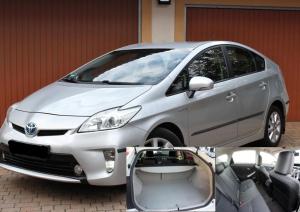 a silver car parked in front of a building at On My way Tours and travels in Colombo