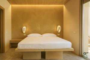 Ένα ή περισσότερα κρεβάτια σε δωμάτιο στο Hotiday Lerici Trebiano