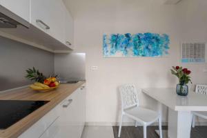 Η κουζίνα ή μικρή κουζίνα στο Apartments in Funtana - Istrien 47116