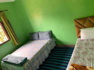 Ένα ή περισσότερα κρεβάτια σε δωμάτιο στο Spacious apartment for families near Ouzoud Falls