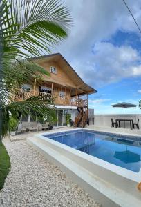 Bazén v ubytování Casa Vivienne Exclusive Beach House nebo v jeho okolí