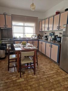 Kuchyň nebo kuchyňský kout v ubytování Nature Brava Stay