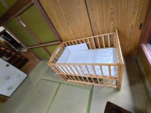 Una cama o camas en una habitación de いすみエンガワのある古民家