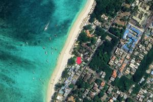 an aerial view of a beach and the ocean at Serge's Beachfront by Serenity in Trou aux Biches +18 photos