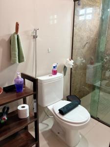 a bathroom with a toilet and a shower at Gravata Paradise in Gravatá +113 photos