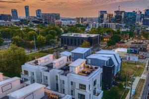 an aerial view of a city with buildings at Luxury Condo - The Gulch - Private Rooftop in Nashville