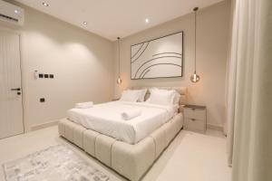 Postel nebo postele na pokoji v ubytování Mostdaf S7