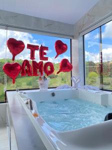 a bath tub with a sign that reads the zombie at Refúgio Da Lua - Buss motorhome in Ametista do Sul +2 photos