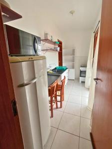 Kuchyň nebo kuchyňský kout v ubytování Apartamento com vista na Trindade