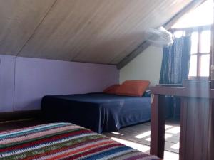 Ένα ή περισσότερα κρεβάτια σε δωμάτιο στο Diciembra