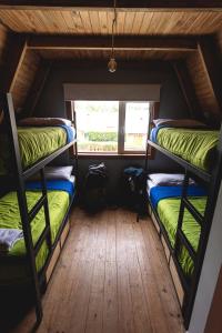 Postel nebo postele na pokoji v ubytování Trastienda Guest House