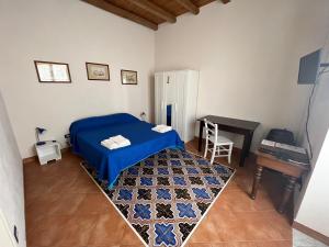 Postel nebo postele na pokoji v ubytování Dimora Tipica