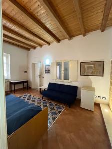 Postel nebo postele na pokoji v ubytování Dimora Tipica