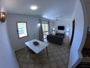 TV a/nebo společenská místnost v ubytování Miguel House