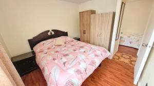 Ένα ή περισσότερα κρεβάτια σε δωμάτιο στο 11-3 Depto amoblado y equipado a pasos de la playa Arica!! +3 φωτογραφίες