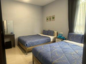 Postel nebo postele na pokoji v ubytování Big Big Big family escape 4BR side pool view, Ipoh