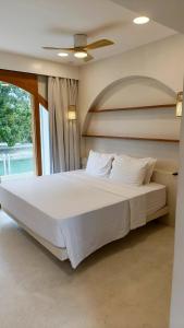 Postel nebo postele na pokoji v ubytování Namal Resort - Free scooter and Gym access