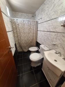 Koupelna v ubytování Colon Parque y Playa 2 a 4 personas